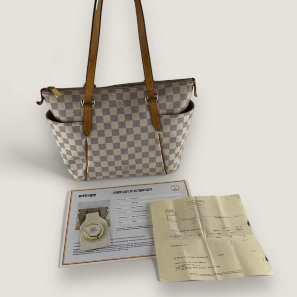 Louis Vuitton tas tweedehands originele factuur