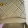 Verkleuring lamsleer Chanel tas