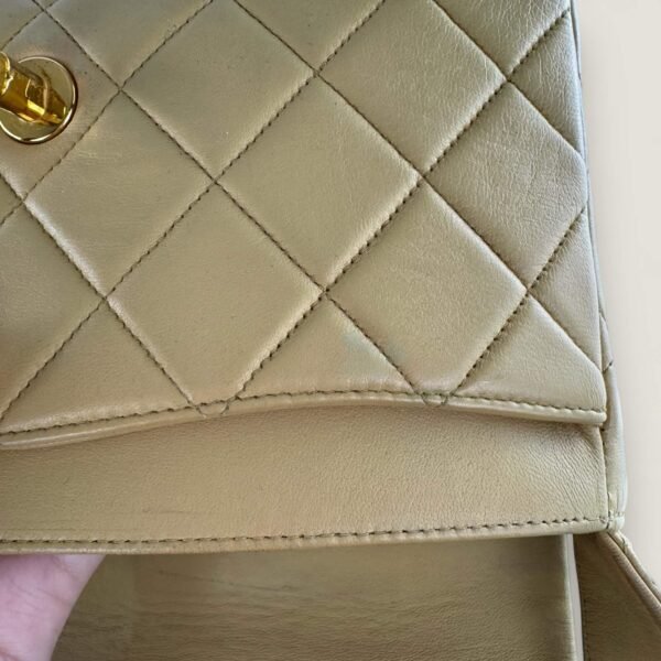 Verkleuring lamsleer Chanel tas
