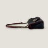 Zijaanzicht tweedehands Gucci GG Marmont zwart met rood leer