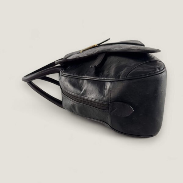 Zijkant Dior Saddle bowler tas