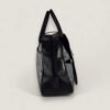 Zijkant tweedehands Dior saddle handtas