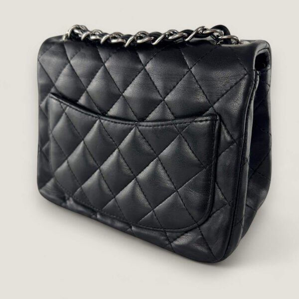 pre-owned Chanel mini crossbody black lambskin
