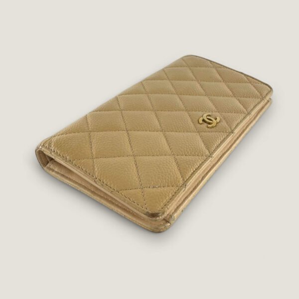 pre-owned Chanel wallet beige caviar