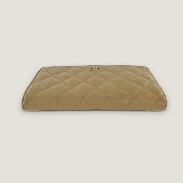 pre-owned Chanel wallet beige caviar leather