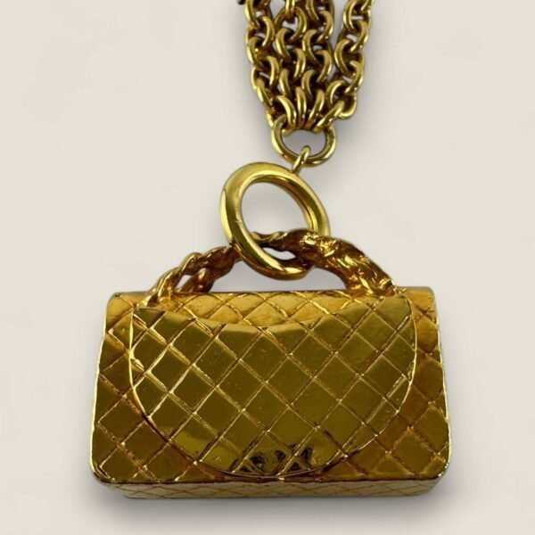 Achterkant Mona Lisa pocket Chanel vintage classic flap ketting
