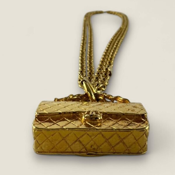 Chanel gold plated CC flap charm pendant necklace golden