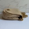 Chanel halve maan schoudertas beige lamsleer