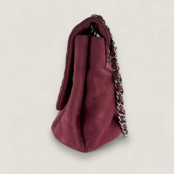 Chanel schoudertas roze leer - zijkant Chanel schoudertas roze leer - zijkant