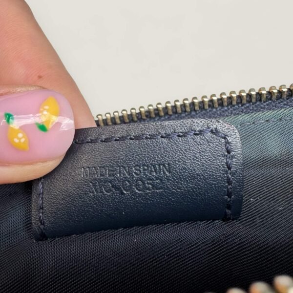 Dior authentieke saddle pouch serienummer 2002