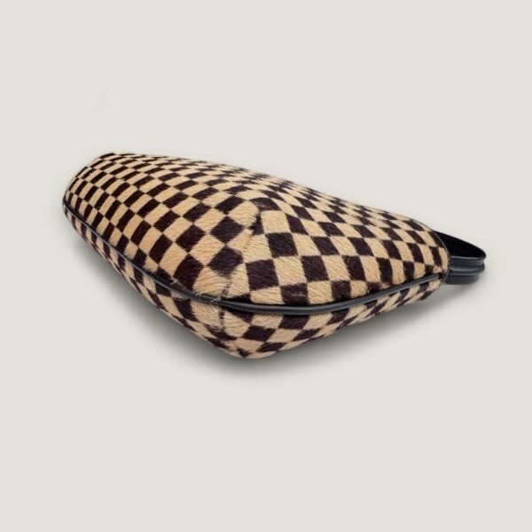 Louis Vuitton Tigre hoekje vintage staat