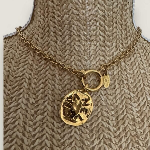 Pre-owned Chanel necklace cutout pendant 24k goldplated