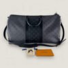 Pre-owned Louis Vuitton Keepall 50 met accessoires