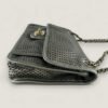 Zijkant Chanel up in the air bag