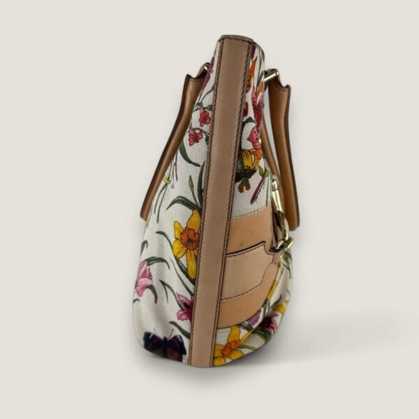 zijkant Gucci tas bloemenprint vintage
