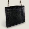 Achterkant Chanel vintage flapbag Achterkant Chanel vintage flapbag