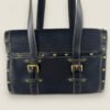 Louis Vuitton L’Epanoui GM zwart achterkant van de tas Louis Vuitton L’Epanoui GM zwart achterkant van de tas