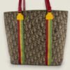 Tweedehands Dior Rasta tas in Y2K stijl Tweedehands Dior Rasta tas in Y2K stijl
