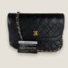 Chanel half moon flap zwart lamsleer