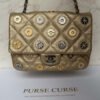Chanel metallic gold perforated lambskin bag