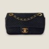 Chanel small chevron wrinkled calfskin surpiqué flap bag medallion charm