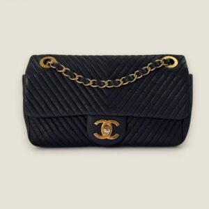 Chanel small chevron wrinkled calfskin surpiqué flap bag medallion charm