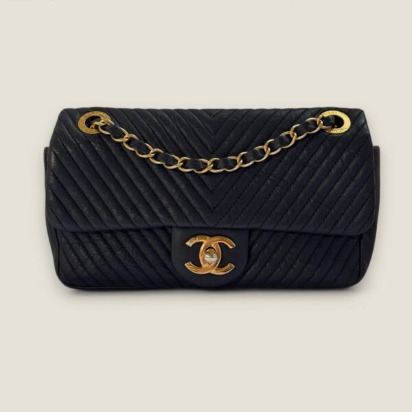 Chanel small chevron wrinkled calfskin surpiqué flap bag medallion charm