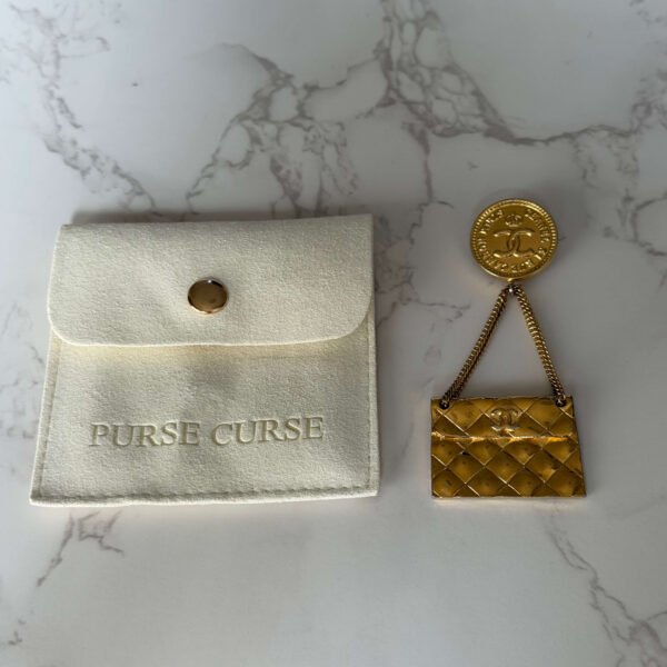Purse Curse vintage broche Chanel