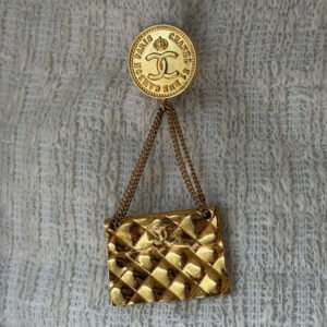 vintage Chanel broche classic flap bag