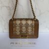 Chanel pre-owned 2014-2015 Small Quilted Metallic Lambskin Interwoven CC Boy Flap crossbody bag