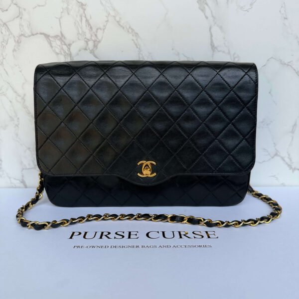 Tweedehands Chanel vintage matelassé single flap donkerblauw lamsleer