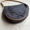 Tweedehands Christian Dior denim saddle pochette Tweedehands Christian Dior denim saddle pochette
