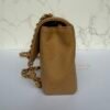 Zijkant vintage Chanel East West beige caviar flap Zijkant vintage Chanel East West beige caviar flap