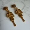 Chanel Mademoiselle earrings feature a dangling design Chanel Mademoiselle earrings feature a dangling design