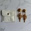 Purse Curse unieke vintage Chanel doll oorbellen clip on 24k verguld Purse Curse unieke vintage Chanel doll oorbellen clip on 24k verguld