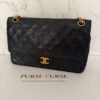 Chanel double flap medium vintage bag front cc lock detail