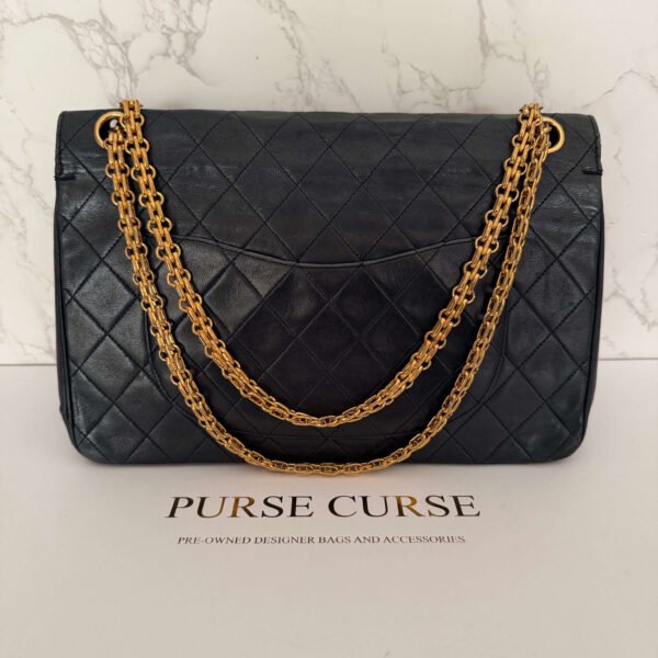 Chanel double flap medium zwart lamsleer achterkant