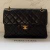Chanel jumbo vintage tas zwart lamsleer close up Chanel jumbo vintage tas zwart lamsleer close up