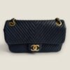 Chanel small chevron wrinkled calfskin surpiqué flap bag medallion charm