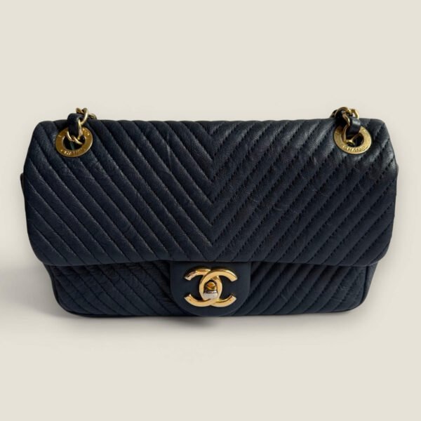 Chanel small chevron wrinkled calfskin surpiqué flap bag medallion charm