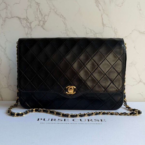 Tweedehands vintage Chanel schoudertas zwart Purse Curse