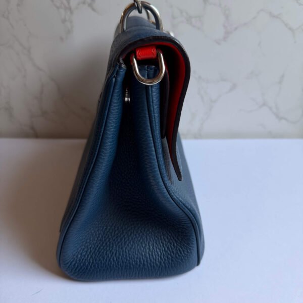 Zijkant Christian Dior handtas